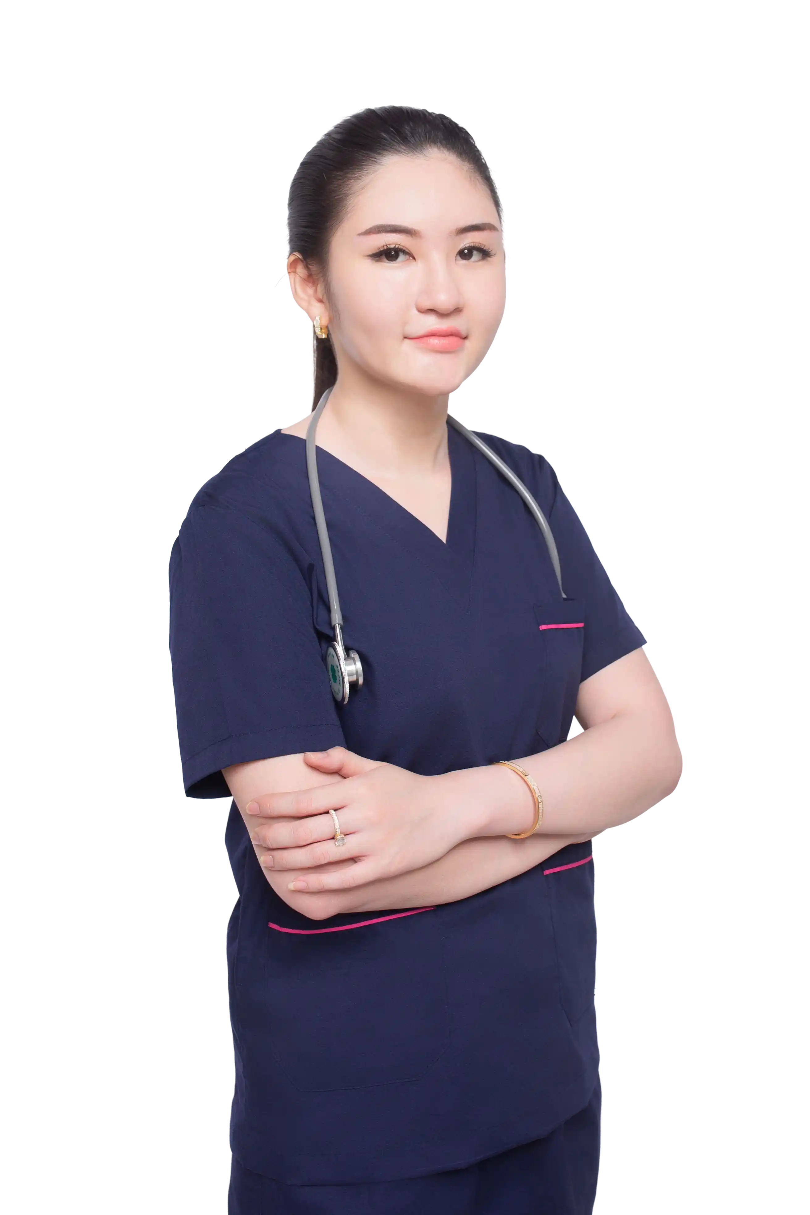 Clinician in navy scrubs with a stethoscope, arms folded