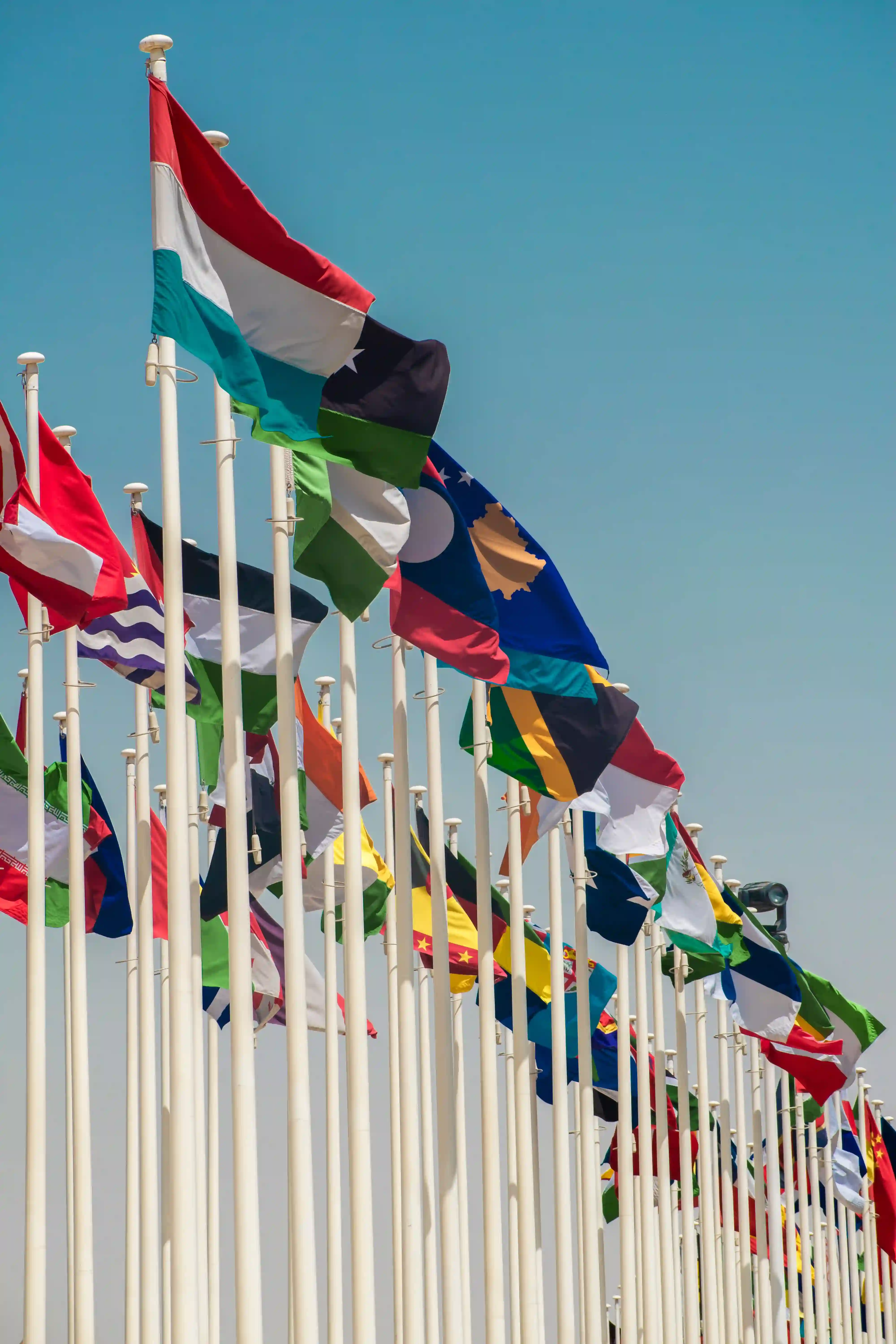 Flags of many nations flying side by side